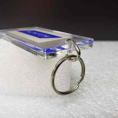 [Keychain] Norton/Christensen Drilling Products, Clear Blue - Angled End: Angled view of end.