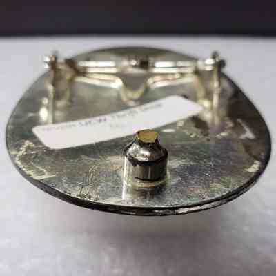 [Belt Buckle] CAT, Ornate, Silver - Hook Stump: Close-up view of the docked hook.