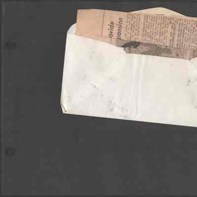 Scan of Scrapbook Page In Situ, Item Partially Visible inside Envelop