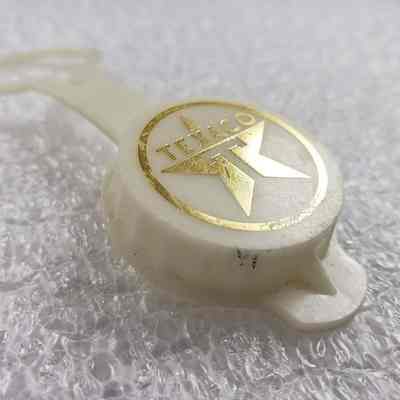 [Bottle Cap] Texaco, White Gold - Angled: Angled view of cap top