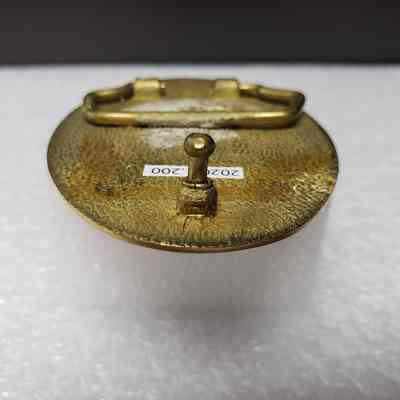 [Belt Buckle] Bill McColman, Black Gold Bronze - Hook: Close-up view of the hook.