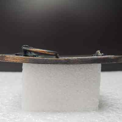 [Belt Buckle] Canadian Superior Oil, Antique-Bronze [Damaged] - Side: View from the side.