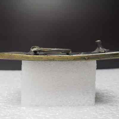 [Belt Buckle] Border Drilling Co. Ltd., Antique-Bronze - Side: View from the side.