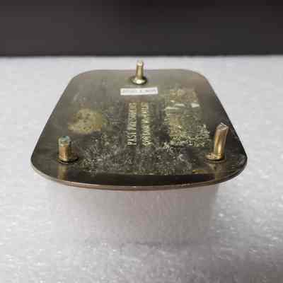 [Belt Buckle] Oilmens Bonspiel Elk Point, 1985, Silver Bronze - Side, Hinge: Close-up view of broken hinge bases.