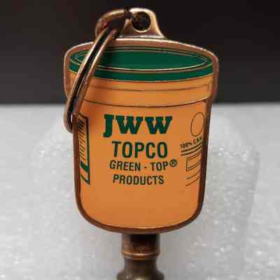 [Keychain] JWW TOPCO, Dual-Ended, Orange Green Copper - Close-Up, Enamel Badge: Close-up of enamel badge section of keychain.