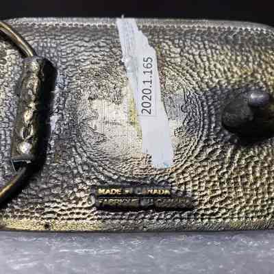 [Belt Buckle] Baltic Drilling, Antique-Bronze - Maker's Mark: Close-up view of the maker's mark on the back.
