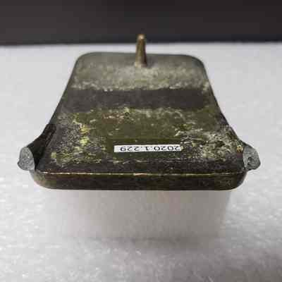 [Belt Buckle] B&R Transport Ltd., Leather Antique-Bronze - Hinge: Close-up view of the reminents of the hinge.