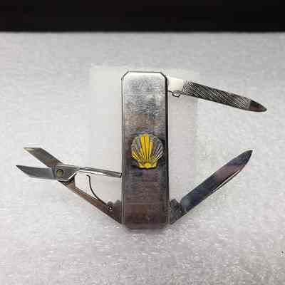 [Pocket Knife] Shell Oil, Silver Yellow - Open: View of front with all elements open
