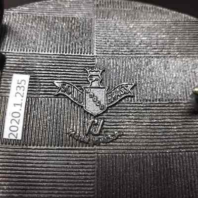 [Belt Buckle] Bronco Drilling Fluids, Antique-Bronze - Maker's Mark: Close-up view of the maker's mark on the back.
