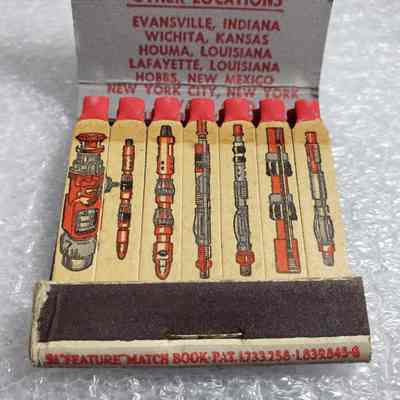 [Matchbook] Guiberson Specialty Oil Field Equipment, 21-strike, Red Green Gold - Matches: Close-up view of matches