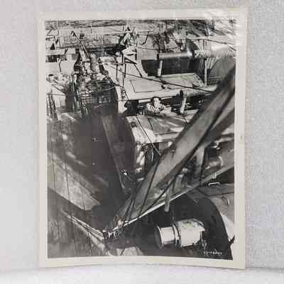 [Photo] Man Leaning on Rig Equipment, 158577, Large, BW