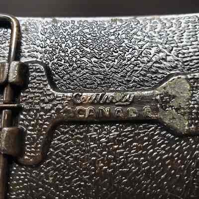 [Belt Buckle] Baker Production Technology, Antique-Bronze - Maker's Mark: Close-up view of maker's mark on the back.