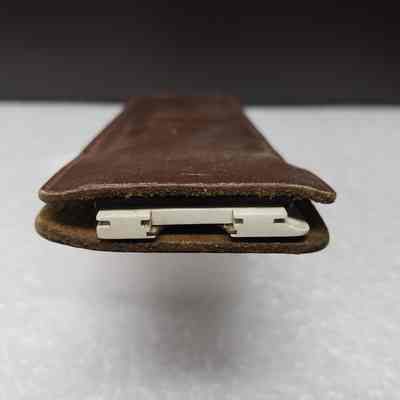 [Slide Rule] Dominion Bridge Co. Ltd./Riverside Iron & Engineering Works Ltd., White Plastic, Brown Leather - Opening Case: View of case opeing with slide rule inside.