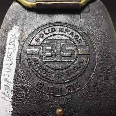 [Belt Buckle] Challenger Drilling, Safety Award, 1981, Antique-Bronze - Maker's Mark: Close-up view of the maker's mark on the back.