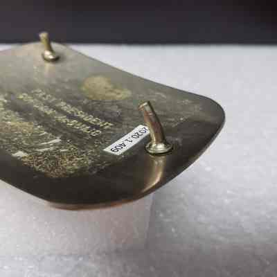 [Belt Buckle] Oilmens Bonspiel Elk Point, 1985, Silver Bronze - Hook Close-Up: Angled close-up view of the hook