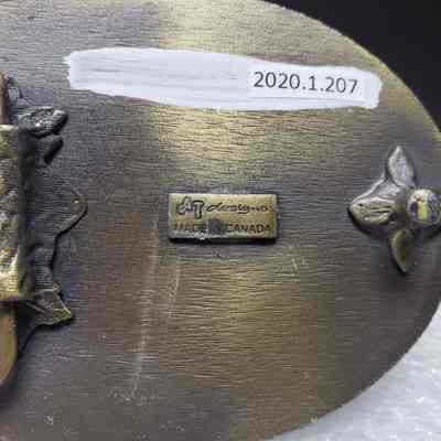 [Belt Buckle] Blackburn Water Hauling, Antique-Bronze - Maker's Mark: Close-up view of the maker's mark on the back.