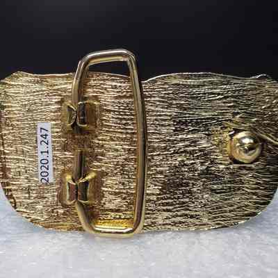 [Belt Buckle] Canadian Northwest Carrier Inc., Gold Enamel - Back: View of the back.