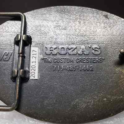 [Belt Buckle] Blue Iron Boys National, Antique-Bronze - Maker's Mark: Close-up view of the maker's mark on the back.