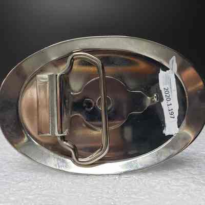 [Belt Buckle] Big John's Tong Service Ltd., Silver Red Blue - Back: View of the back.