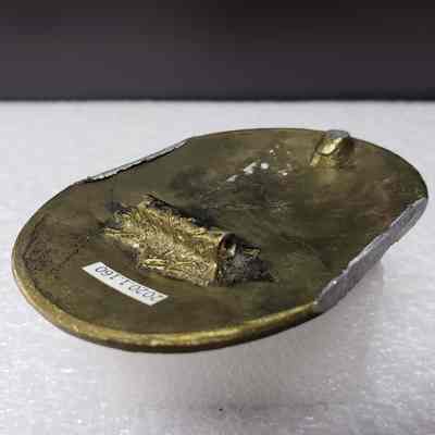 [Belt Buckle] Baker Oil Treating, Antique-Bronze White [Damaged] - Hinge: Angled view of hinge (missing).
