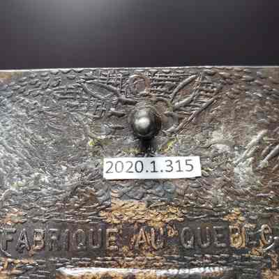 Makers mark, back, with hook detail