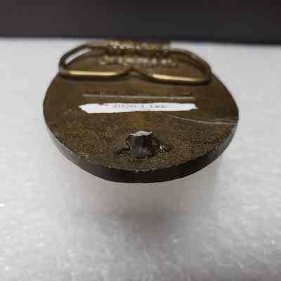[Belt Buckle] Beaver Drilling, Antique-Bronze [Broken] Hook, Broken: Close-up view of the remains of the hook.