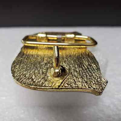 [Belt Buckle] Canadian Northwest Carrier Inc., Gold Enamel - Hook: Close-up view of the hook.