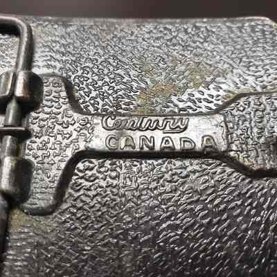 [Belt Buckle] Avenge Canadian, Bronze - Maker's Mark: Close-up view of maker's mark on back.