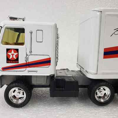 Side view, truck right-side straight-on, truck and trailer