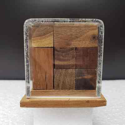 [Puzzle Cube] NOVA Corporation, Wood - Left Side: View of the left side.