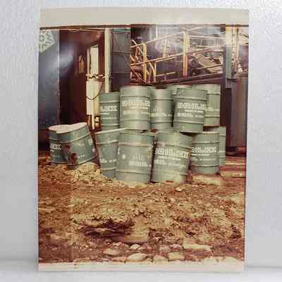 [Photo] Drilex Barrels Beside Oil Rig Equipment, Oversized, Colour