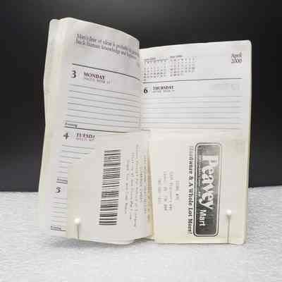 [Pocket Diary] 2000, "A-1 Tire & Battery Service" - Insert 1: View of pages with insert item in situ