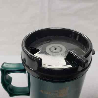[Travel Mug] Rainbow Pipeline, Green Black Gold - Angled Top: Angled view of lid on travel mug