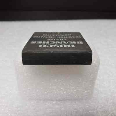 [Matchbook] Dominion Oilfields Supply Co. Ltd., 20-strike, Black Silver - Saddle: View of saddle
