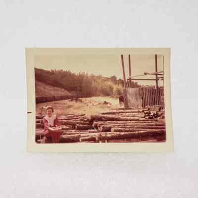 [Photo] Lady Seated on Logs, Association of Desk and Derrick Clubs, Small, Landscape, White Border, c.1972