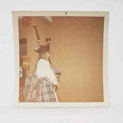 [Photo] Lady Playing the Bagpipes and Wearing Kilt, Tartan Banquet, Association of Desk and Derrick Clubs, Square, White Border, c.1972