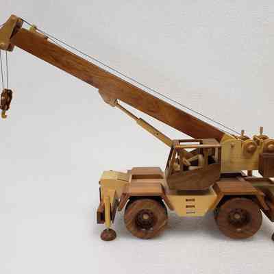 Right-side view, partially lowered crane arm