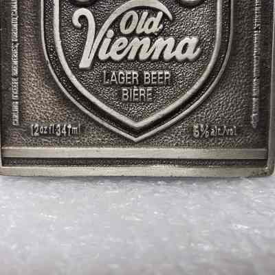 Belt Buckle] Old Vienna Lager, 1978 - Close-Up Bottom: Close-up view of bottom elements on the front