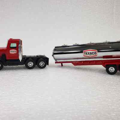Side view, truck cab and tanker seporated