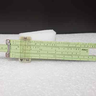 [Slide Rule] Pritchard Canadian Ltd., A. Kowalchuk, Brown Leather - Back Slide Rule, Extended: Back view of slide rule, extended