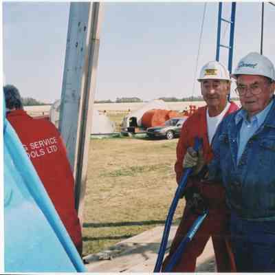 [Photo] Two Men Beneath the Wood Cable Rig, Leduc #1 Energy Discovery Centre, Colour, 4x6in
