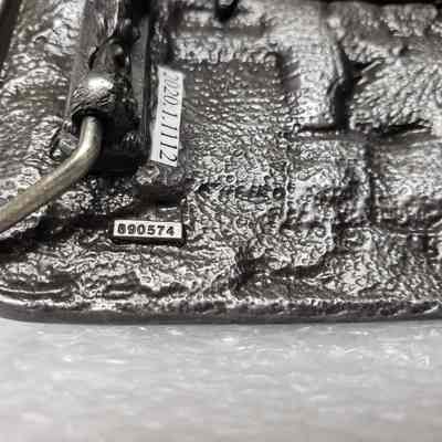 [Belt Buckle] Snap-On, Antique-Silver - Code, Close- Up: Close-up view of code, unknown.