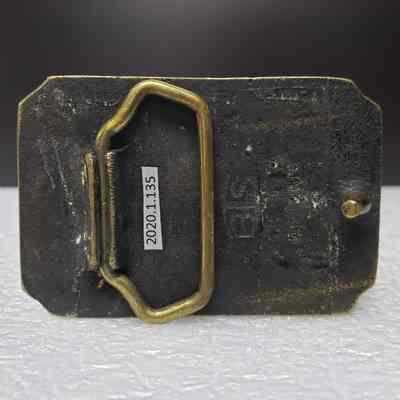 [Belt Buckle] Alberta Perforators Inc., Bronze - Back: View of back.