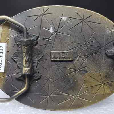 [Belt Buckle] Alberta Governor Service Ltd., Bronze - Maker's Mark: Close-up view of maker's mark.