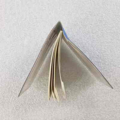 [Notepad] Texaco, Clear Cover, Blue - side View: View of notepad from side-on
