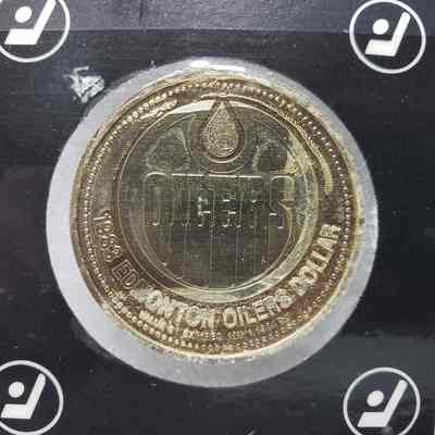 [Coin] 12 Dave Hunter/Edmonton Oilers, Hockey Dollars, 1983, In Packaging - Close-Up Tails: Close-up view of 'tails' side with Edmonton Oilers
