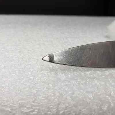 [Letter Opener] Canadian Wire and Cable Co., inc. Ruler - Close-Up Tip: Close-up view of letter opener tip, bent