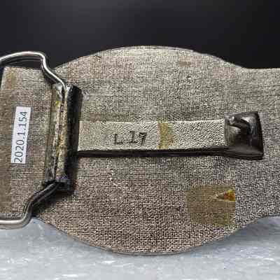 [Belt Buckle] Autocar, Silver - Maker's Mark: Close-up view of maker's mark on back.