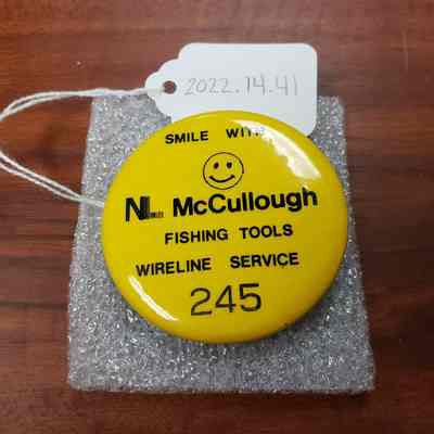 [Button] NL McCullough Fishing Tools Wireline Service, "245", Pinback, Yellow Black