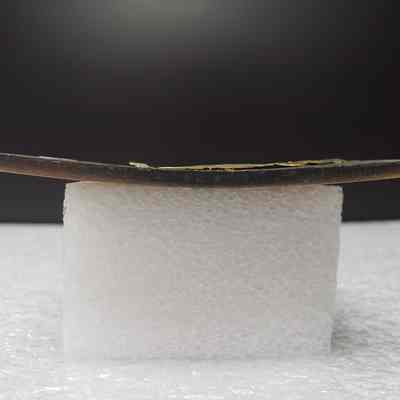 [Belt Buckle] Challenger Drilling, Antique-Copper [Damaged] - Side: View from the side.